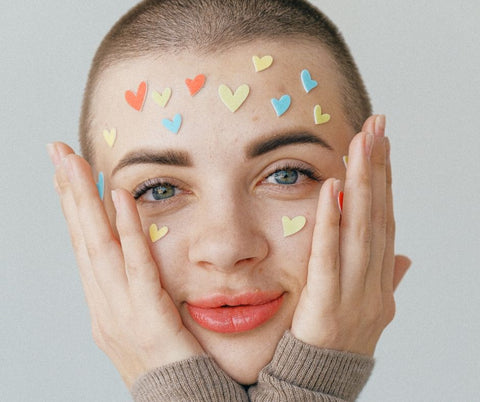 Woman massaging her face