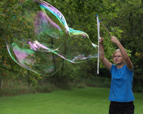 Extreme Bubbles Inc. makes bubble toys, big bubble wands, giant bubble kits and bubble solution that work better than homemade giant bubble recipes and do it yourself bubble wands