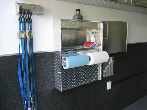 various car hauling trailer storage and organization solutions such as a ratchet strap hanger and workstation