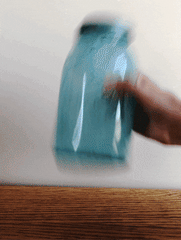 toilet paper dissolving in jar of water