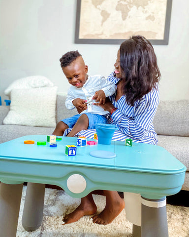 Eizzy Baby founder Assie and her son Noah during playtime