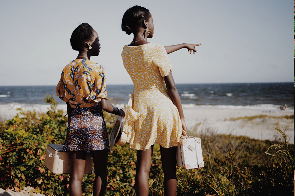Shelcy and Christy, the sisters behind @nycxclothes, carry our Sweetheart Vanity to the beach.