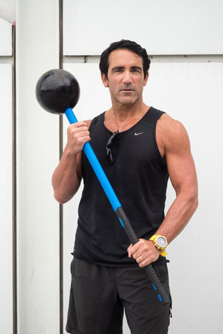 Tom Holland fitness expert with fitness sledgehammer the Core Hammer from MostFit