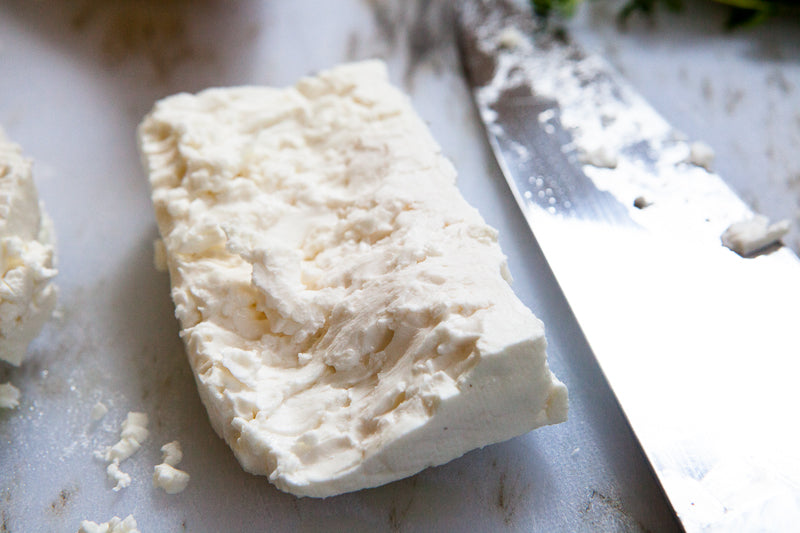 Cut Feta Lesbos cheese - by Mia Nakano Photography