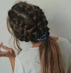 Girl with braids and scrunchie