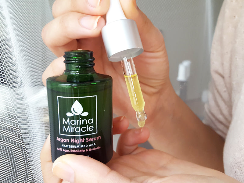 Marina Miracle argan night serum dropper