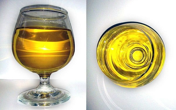 Golden EVCLO in wine glass