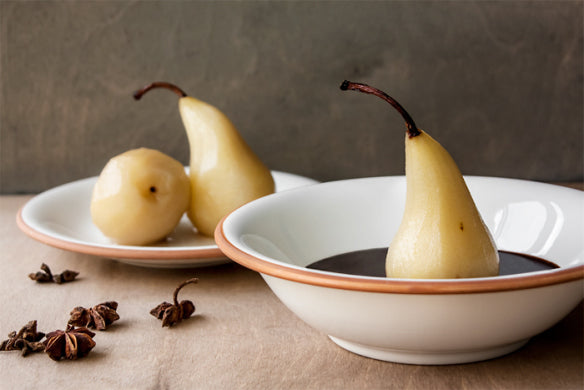 SPICED POACHED PEARS WITH WARM CHOCOLATE SAUCE by Ora Coren (Photo by Lee Coren)