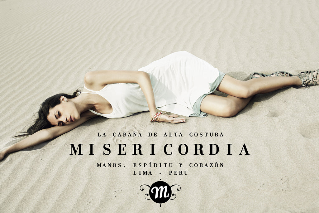 Campagne Collection Misericordia été 2011 jeune femme allongée de manière lascive dans le en robe blanche épurée 
