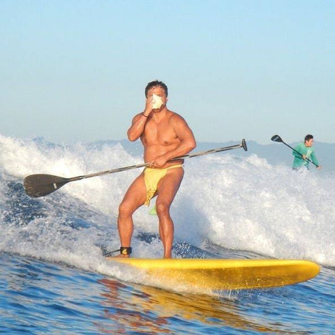 surfing a paddleboard