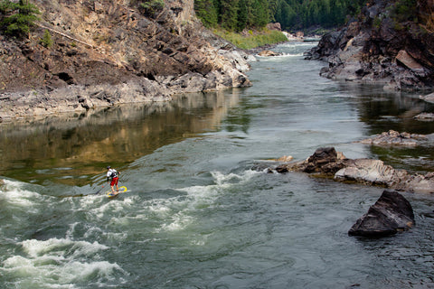 paddle board on a river