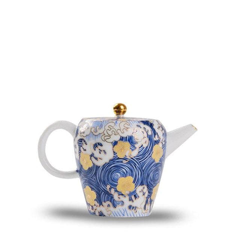 Petite théière bleue et blanche en porcelaine