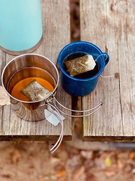 Camping mugs with tea