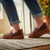 Women's Recycled Camden Moccasins in walnut on figure headed outdoors