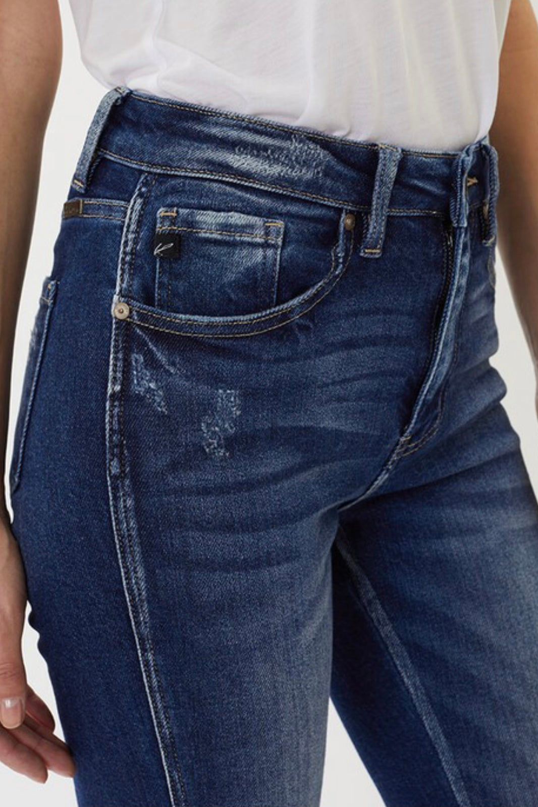 HIRISE BOOTCUT WITH RAW ASYMMETRICAL HEM