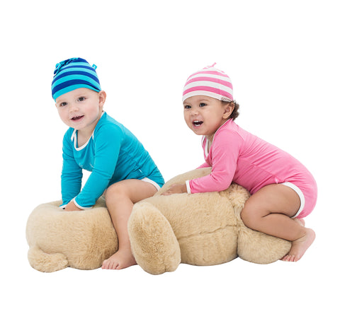 Our Snug-a-licious bubs in aqua and coral onesies