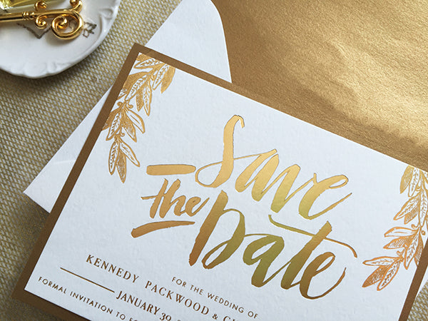 gold foil hand lettered save the date calligraphy