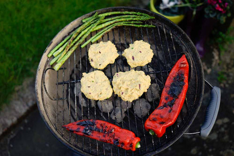 veg burgers on a BBQ