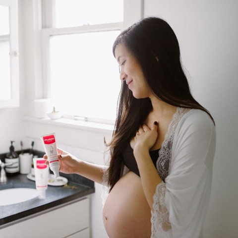 mom with Mustela products