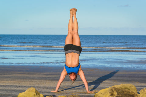 Woman working out on beach