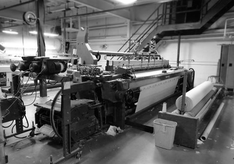 Rapier loom weaving a cotton blanket