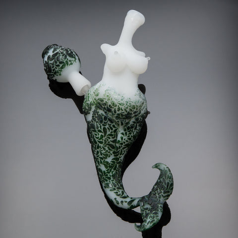 Photo of a glass mermaid pipe