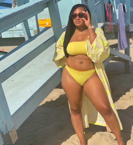 Derria Underwood in yellow bikini at the beach