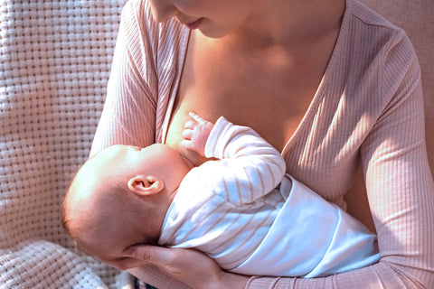 The cross cradle position is great while breastfeeding with a nipple shield. 