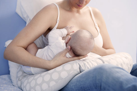 The football hold is great for breastfeeding with a nipple shield. 