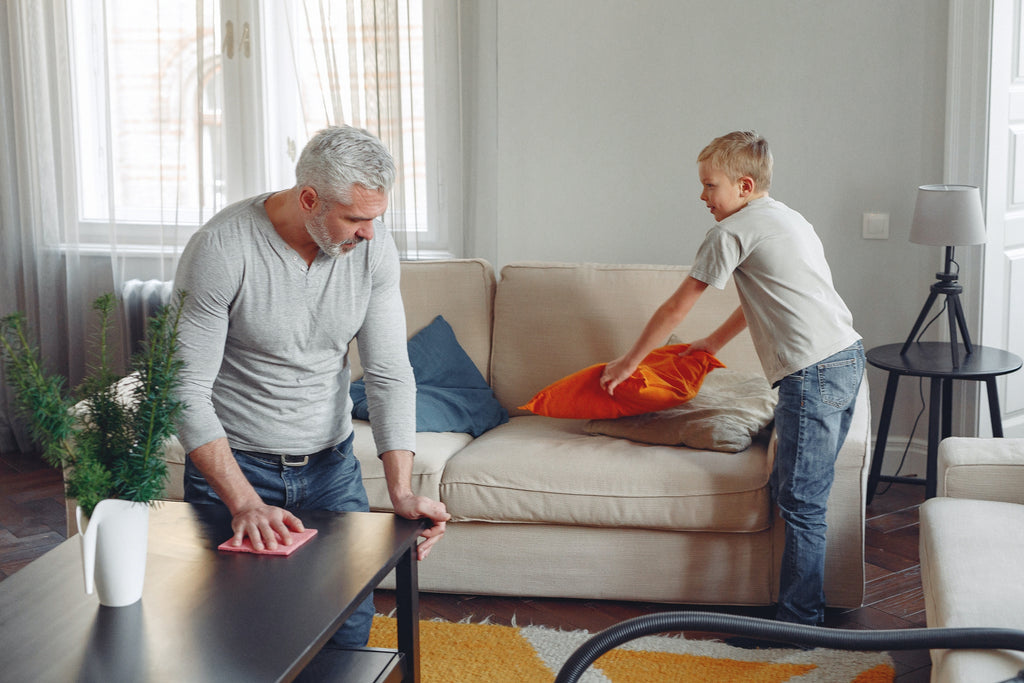 father and son doing household chores