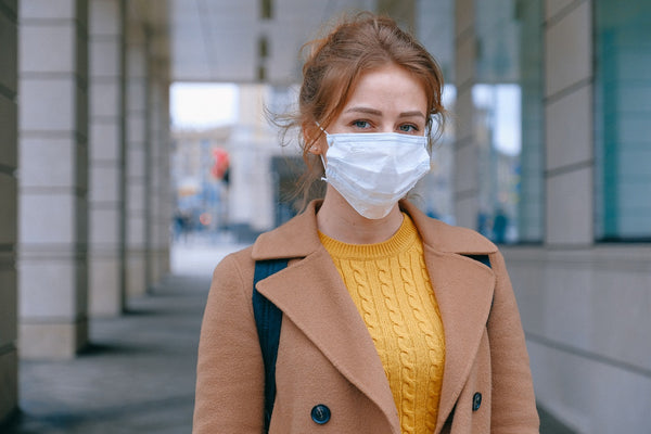 Young lady wearing surgical mask