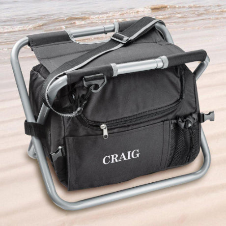Black personalized cooler chair with the name Craig stitched into the side