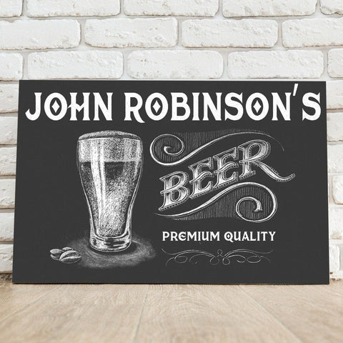 A black bar sign that says John Robinson's Beer Premium Quality