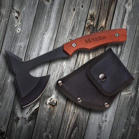 Personalized groomsmen axe hatchet with a wooden handle with the name mcmillan on it