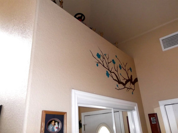 tree wall sticker with blue flowers on the wall