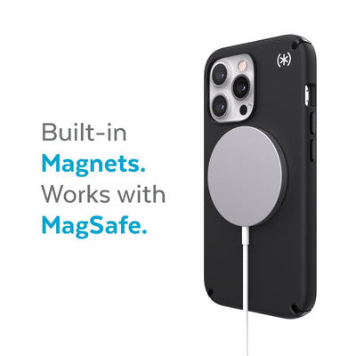 Three-quarter view of back of phone case with MagSafe charger attached - Built-in magnets. Works with MagSafe.