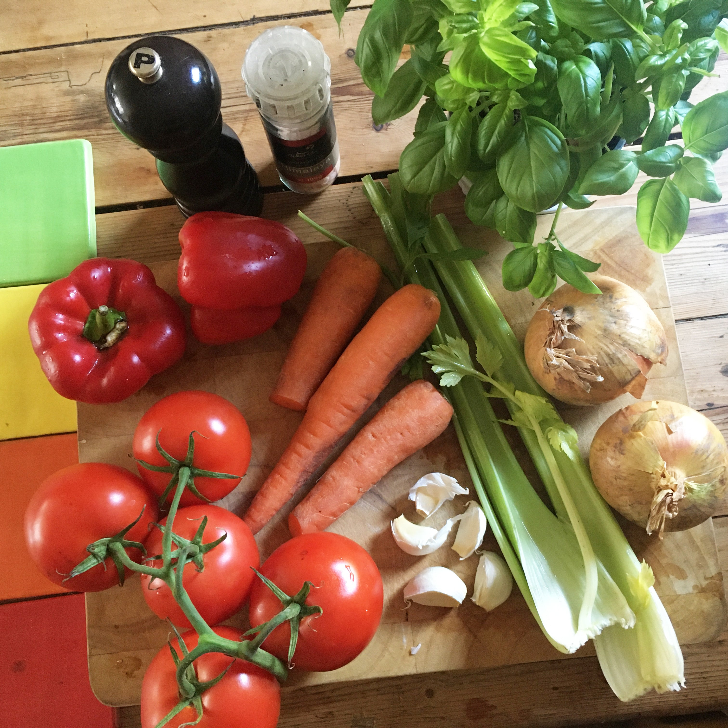 Fresh vegetables to make a delicious tomato soup ready to chop by Kate Guy
