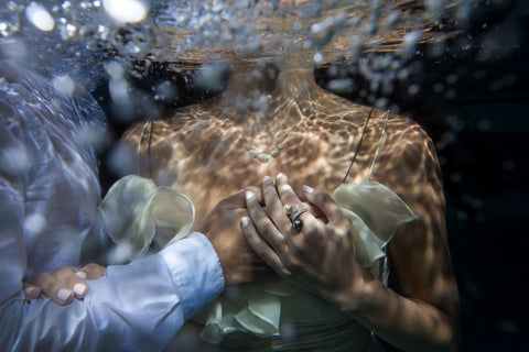 Ivory Couplet Dress Underwater Holding Hands