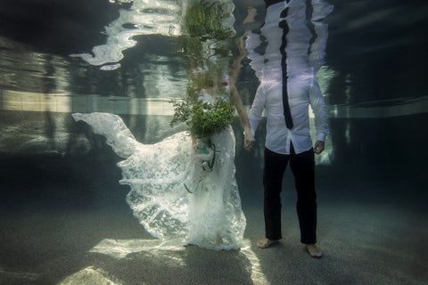 Wedding Dress Underwater Holding Hands