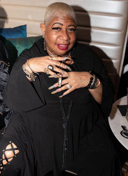 Luenell in a Flowered Vines fortune locket by Fortune & Frame