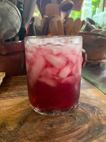 Blueberry Mint Shrub Cocktail in a tumbler glass