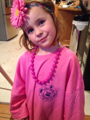 Munchables Pink Beaded Chew Necklace Worn by Girl