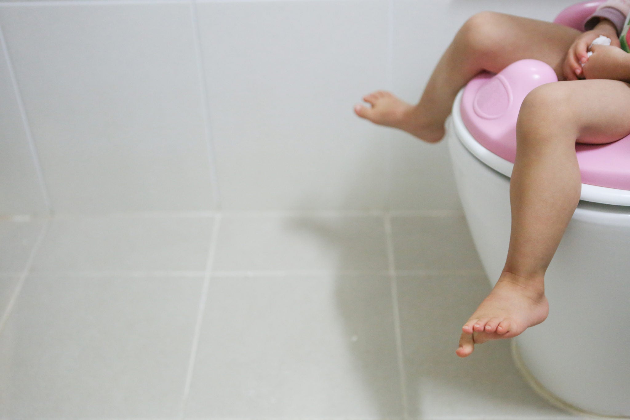 Girl using toilet