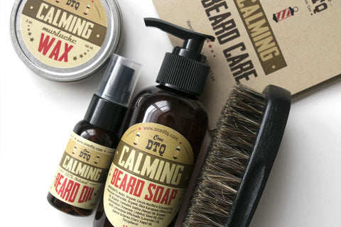Contents: Calming Beard Soap, Beard Oil, Mustache Wax, Beard Brush, & User’s Guide
