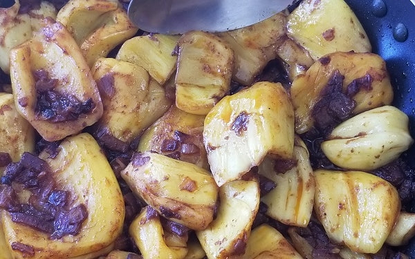 In a large pan first sauté the chopped onion, minced garlic and spices in olive oil for 3-4 minutes, until onions turn translucent.