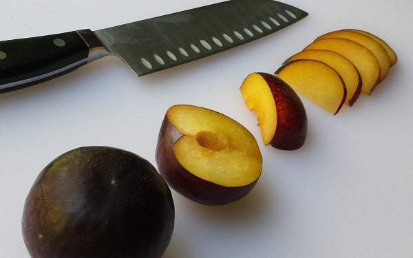 Slice each plum in half, remove pit, then cut into quarters, then slice quarters thin.