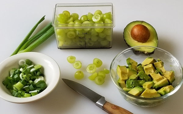 For an older child with some basic knife skills – cut the grapes in half, chop the green onion and dice the avocado.