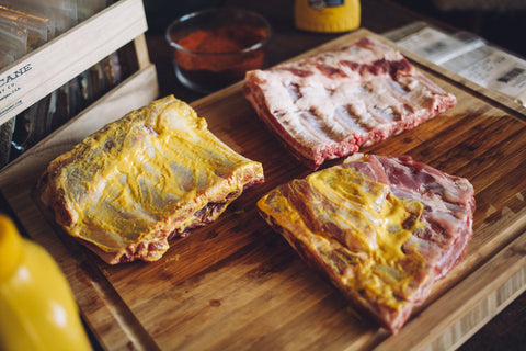 Applying_mustard_to_ribs