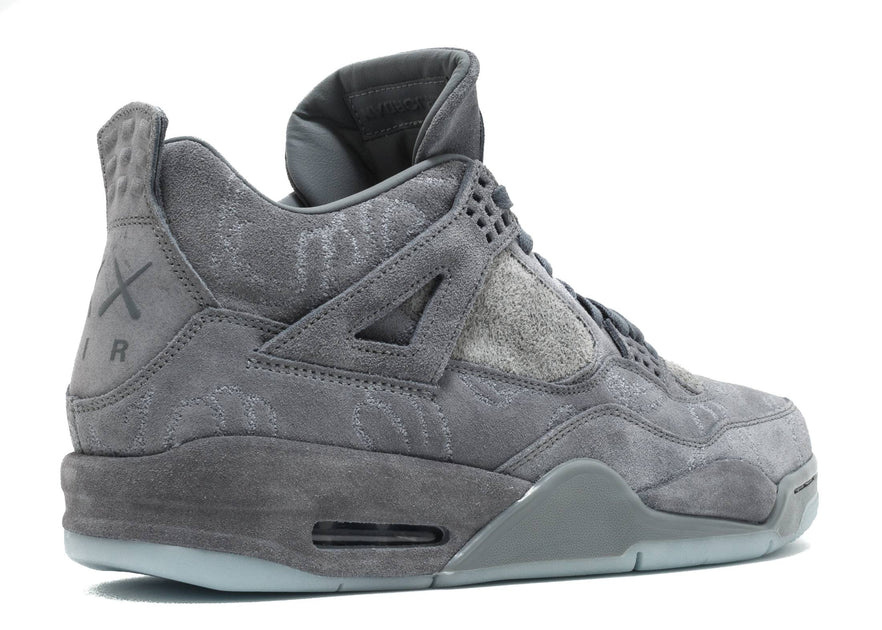 jordan 4 kaws grey on feet