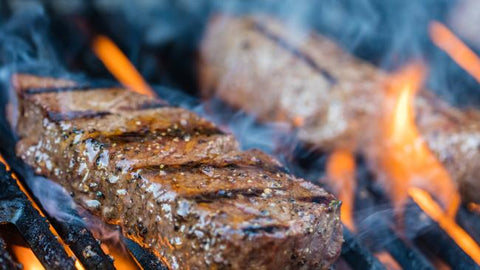 Photo of Steak Being Grilled 